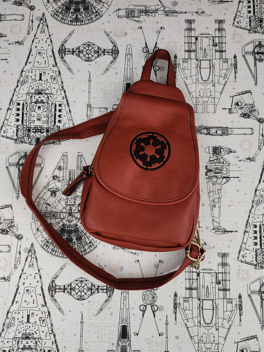 Hybrid backpack/crossbody bag. Vegan leather bag with fan art Imperial Cog embroidered on flap.